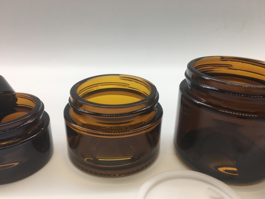 Transparente kosmetische Nachfüllung Amber Glass Jar Straight Round formen mit schwarzem Plastikdeckel