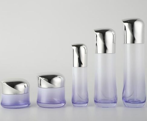 Luxuskosmetische Glasflaschen mit überzogenen Deckeln/Cremetiegel-Lotion füllt das kosmetische Verpacken ab