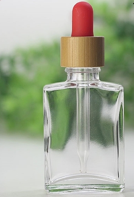 kosmetische verpackende Glasbambustropfflasche der flachen Form-30ml